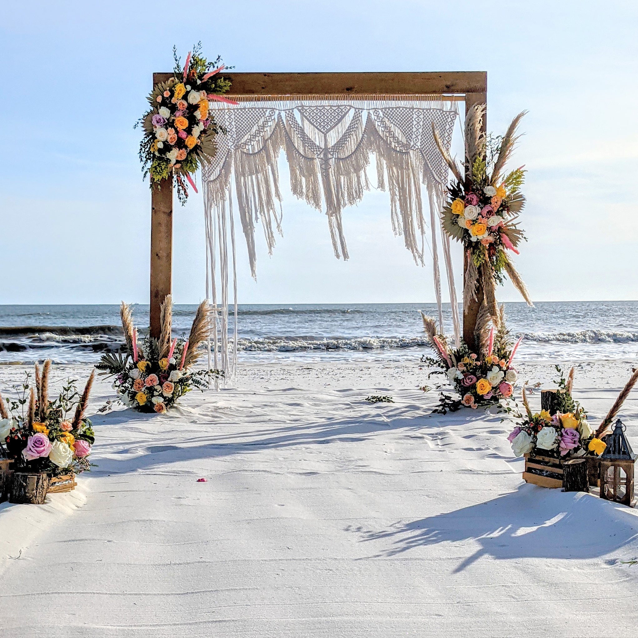 beach wedding arbor rental destination beach wedding ceremony package full service all inclusive in panama city beach 30a destin port st joe boho arbor macrame wedding planner wedding dj wedding officiant wedding photographer in panama city beach