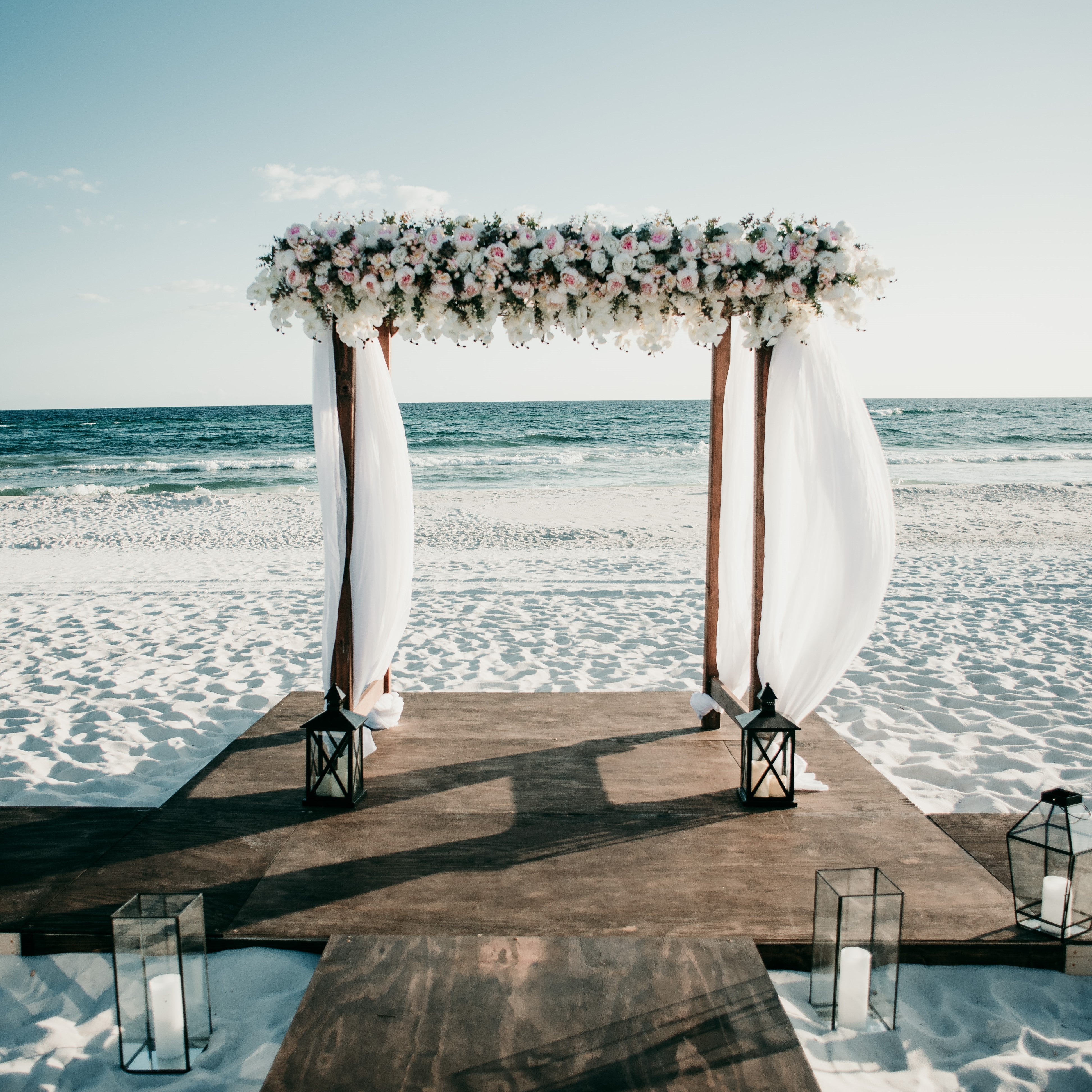 4-post wooden wedding pergola chuppa arbor arch rental in panama city beach beachy coastal romantic garden wedding Boho vibes