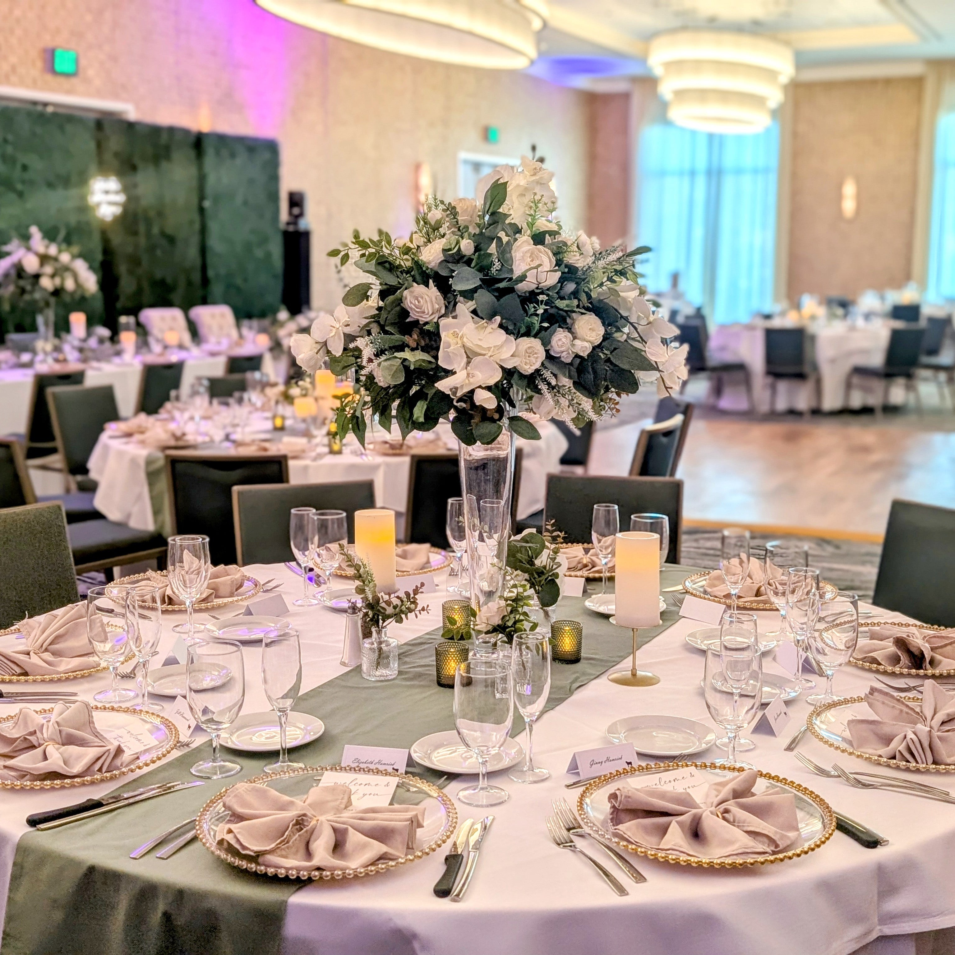 Decorated banquet hall with tables set for a formal event