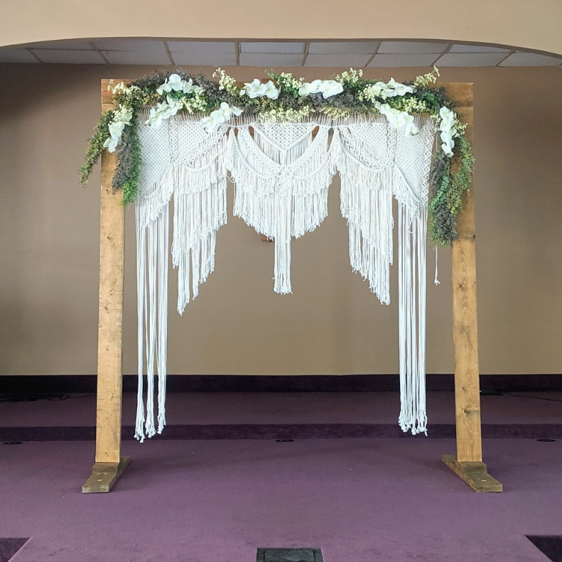 Boho Macrame Wedding arbor with wood arch included for rent in Panama City Beach FL