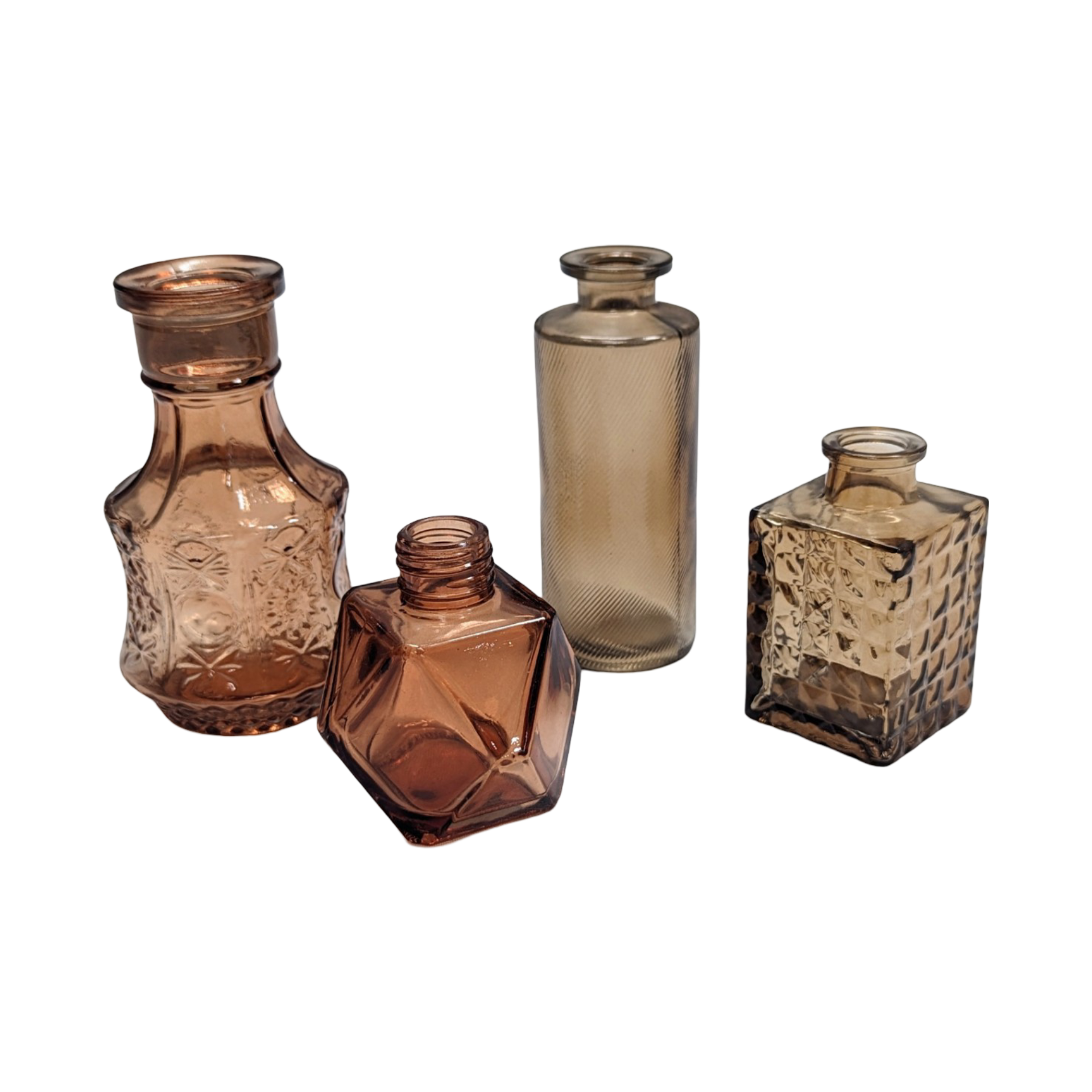 Assorted glass bud vases rental in panama city beach boho brown emerald green clear