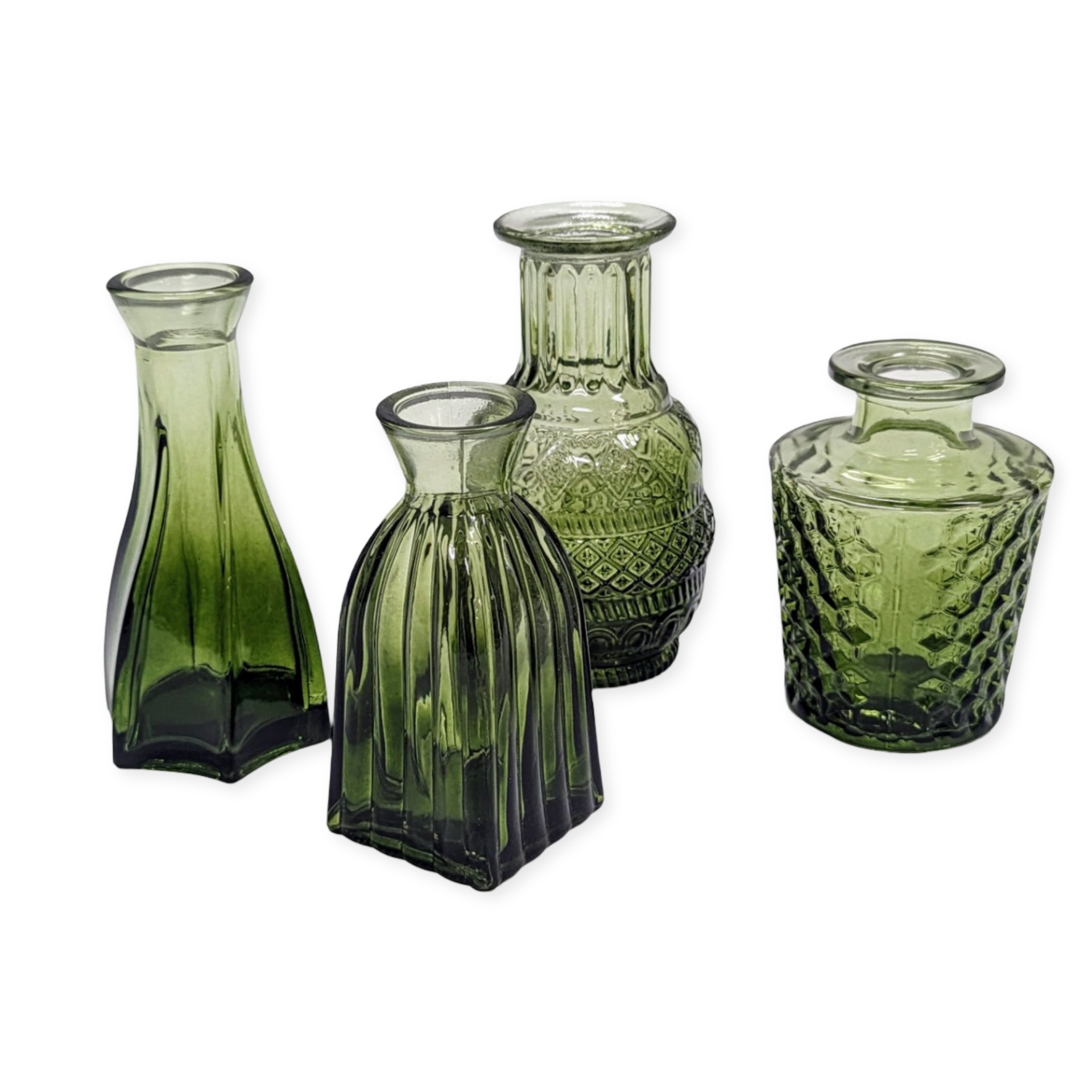 Assorted glass bud vases rental in panama city beach boho brown emerald green clear