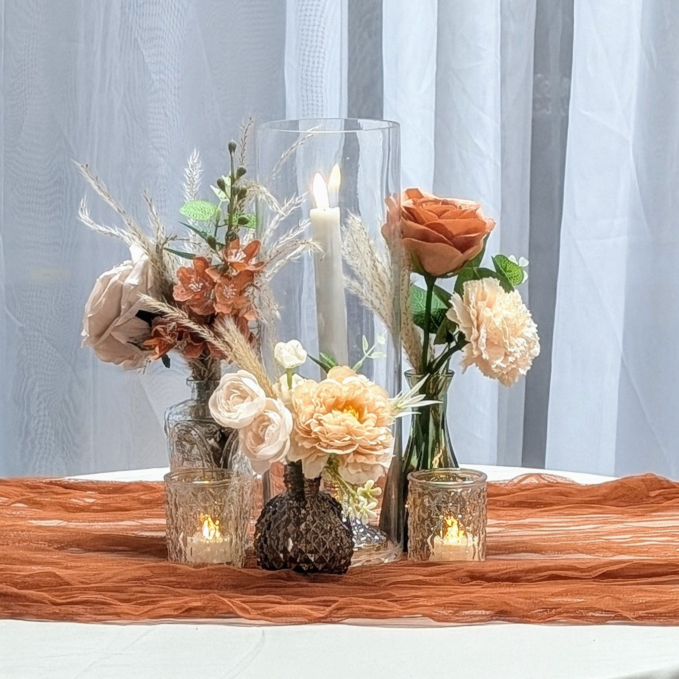 Standard wedding or event centerpiece rental with customized faux florals in panama city beach florida