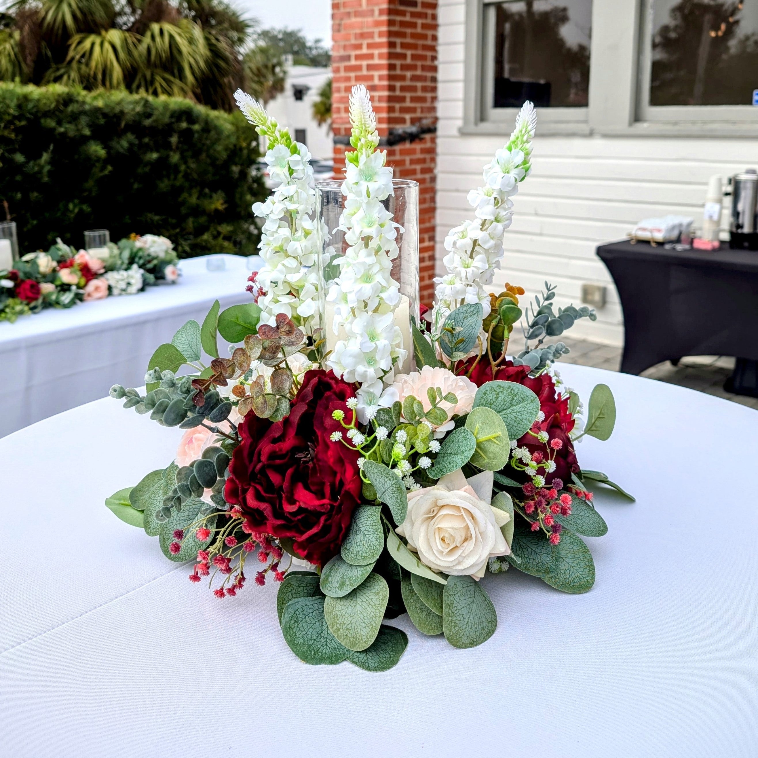 cylinder vase with floral ring led candle rental in panama city beach wedding centerpiece or aisle marker