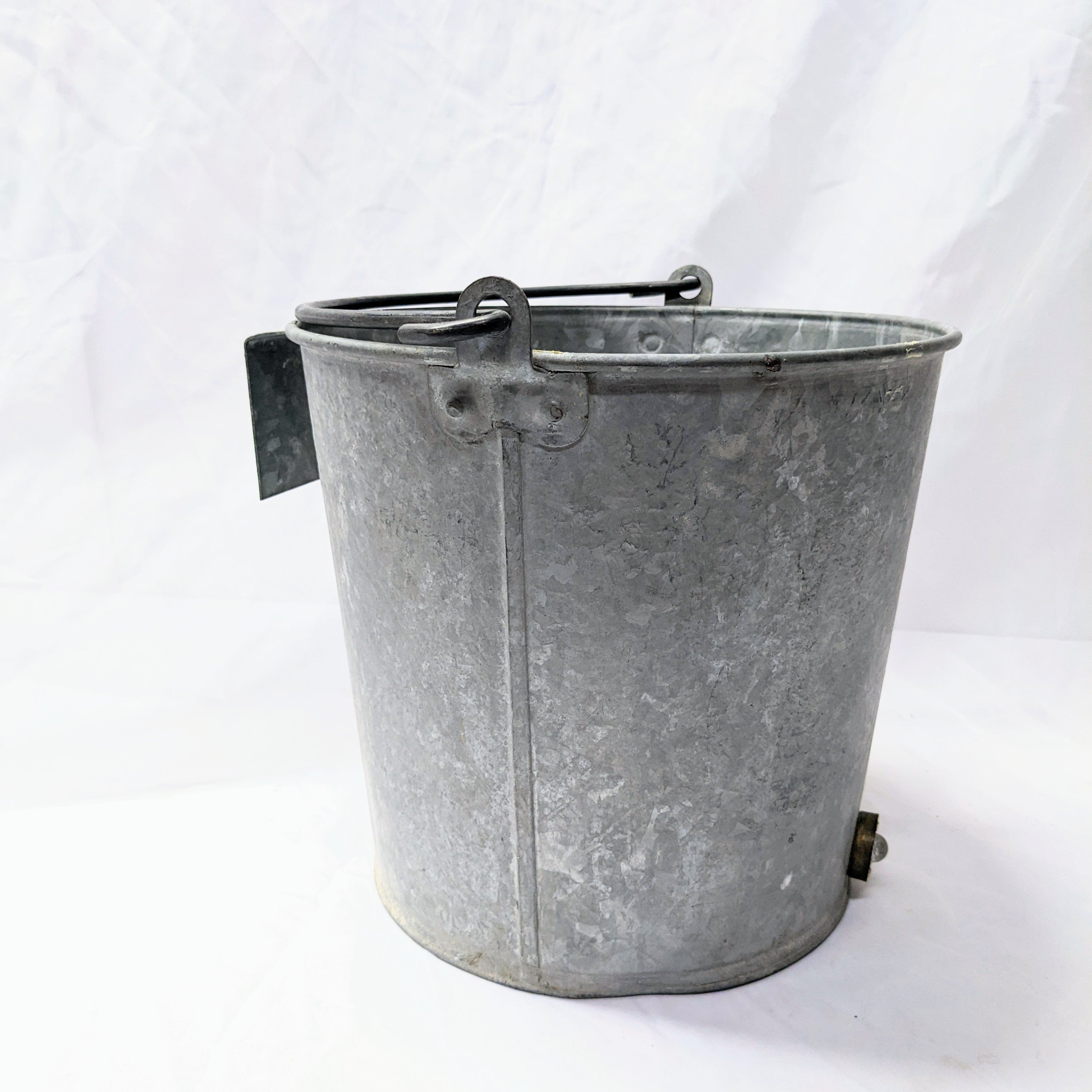 galvanized barn bucket with handle and hook on side to hang from ladder great for wedding party or vintage decor
