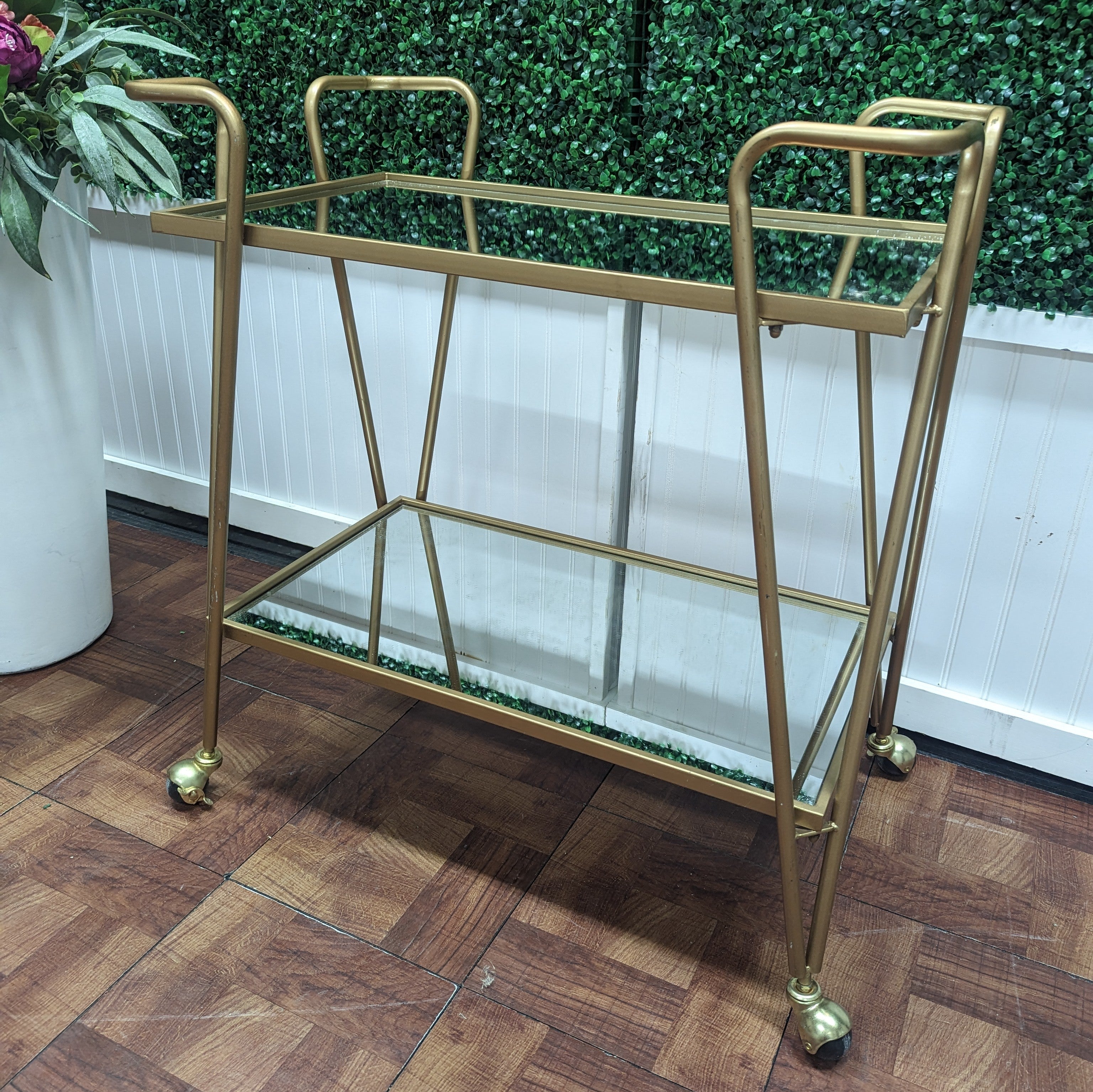 timeless gold metal two tiered bar cart with mirrored shelves