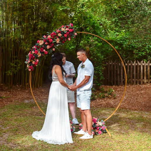 Gold metal circle arbor arch wedding rental in panama city beach florida