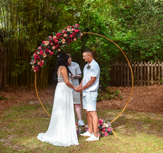 Gold metal circle arbor arch wedding rental in panama city beach florida
