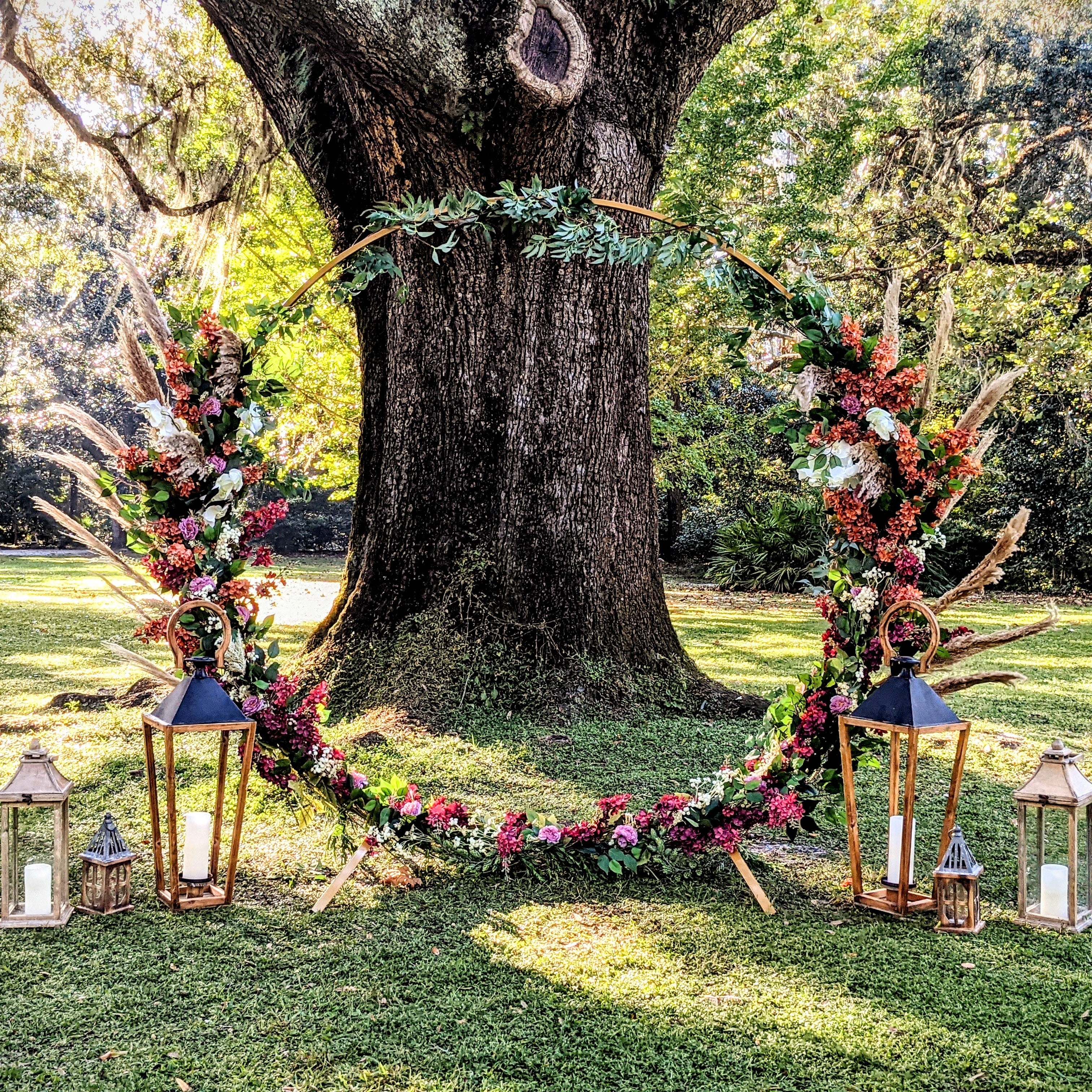 Gold metal circle arbor arch wedding rental in panama city beach florida