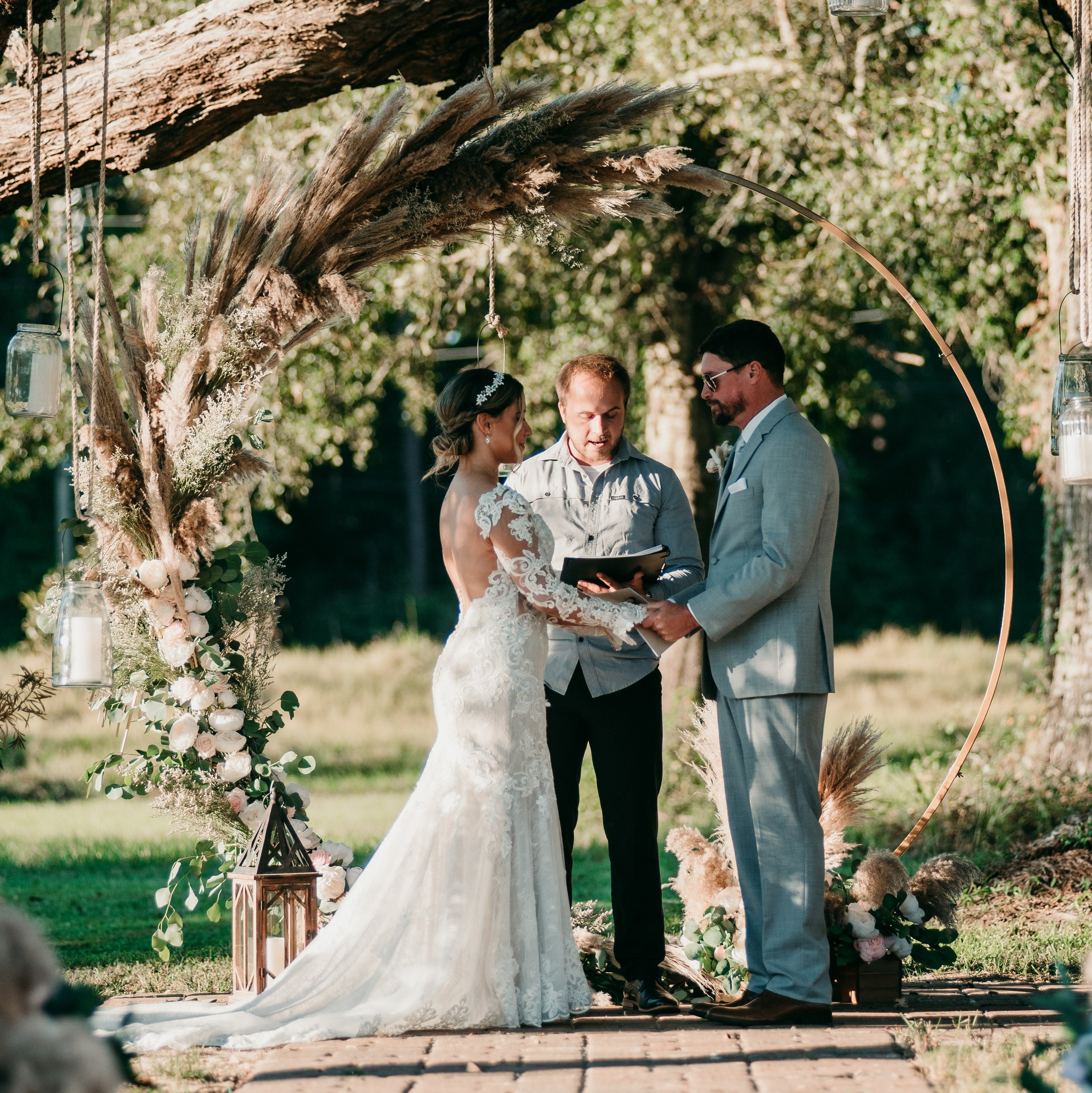 Gold metal circle wedding arbor arch rental in panama city beach florida