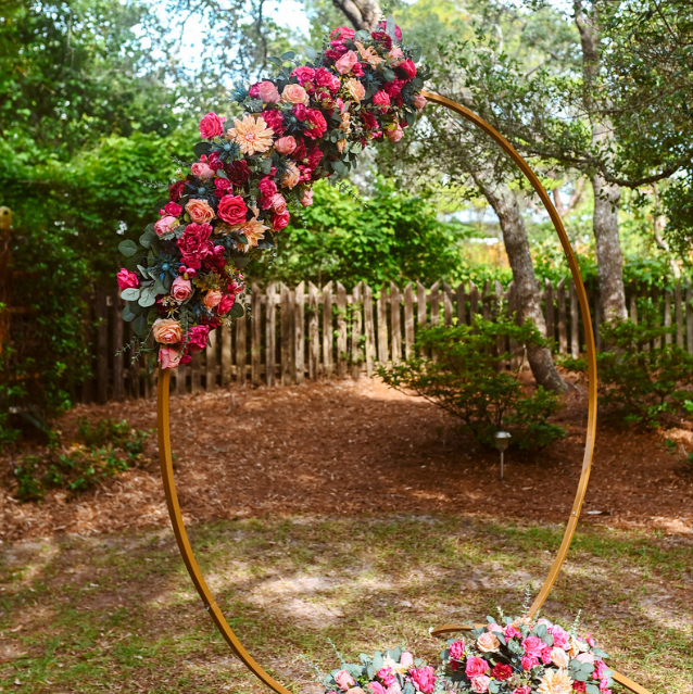 Gold metal circle wedding arbor arch rental in panama city beach florida
