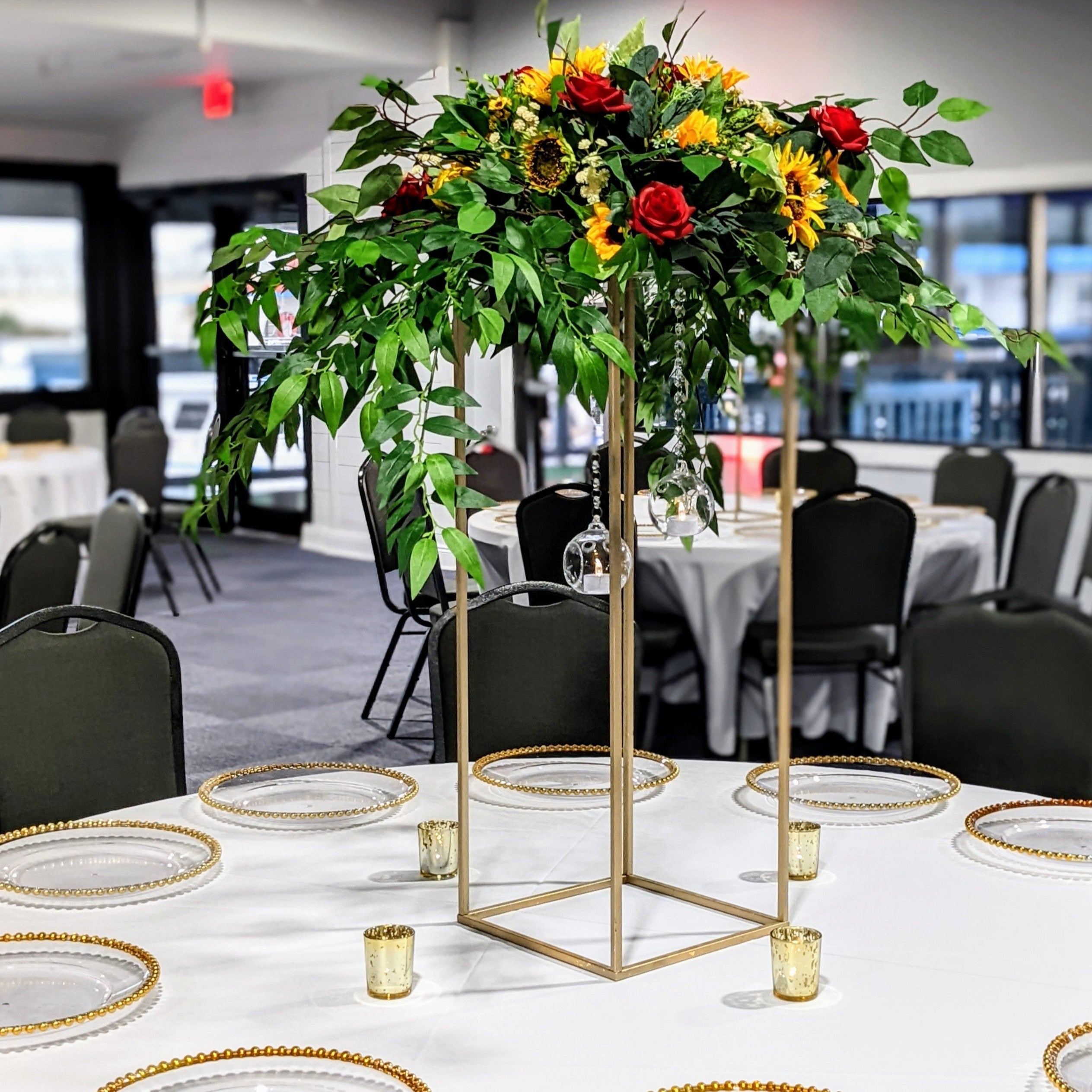 tall open gold frame floral topper centerpiece rental in panama city beach