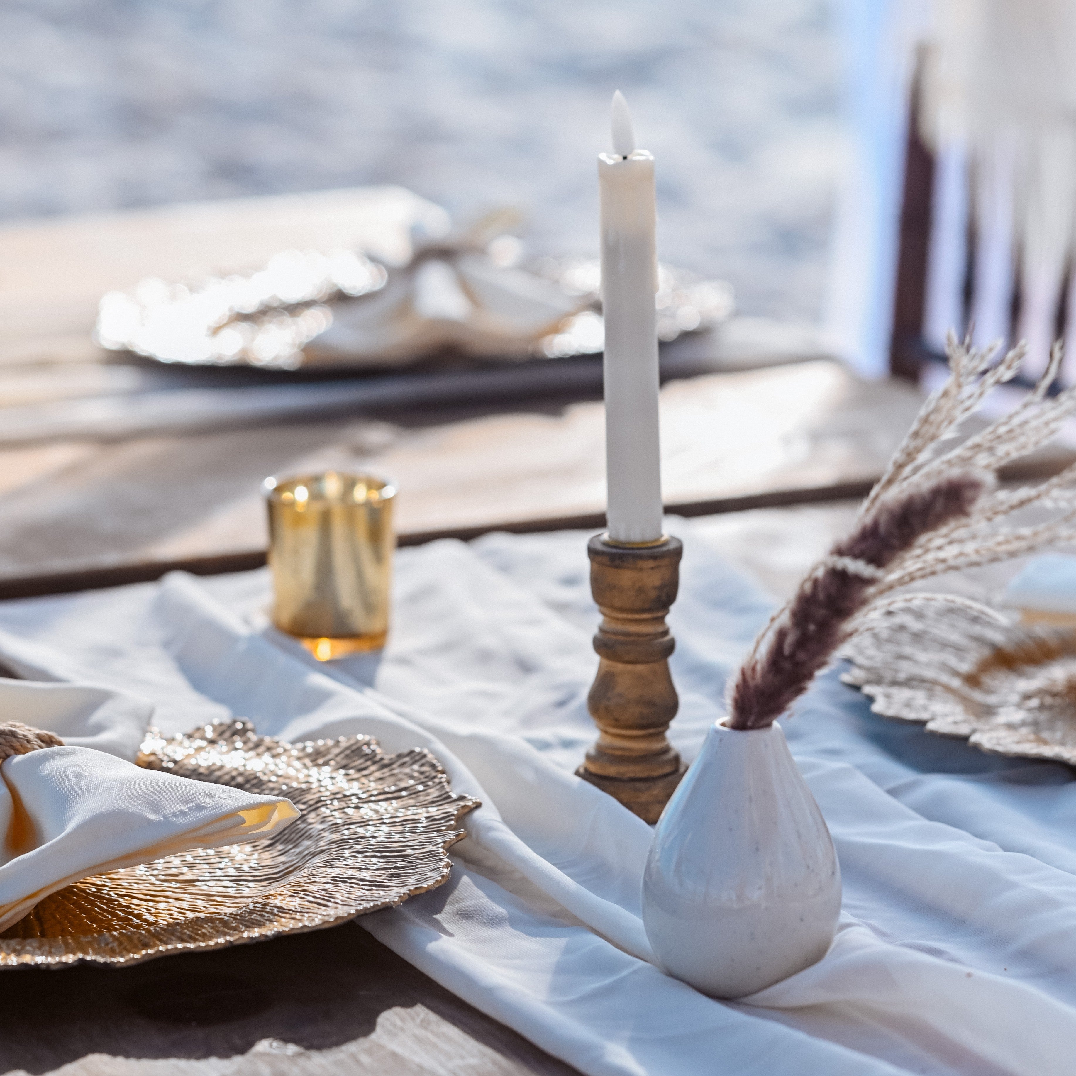 gold wooden tapered candle holder rental in panama city beach