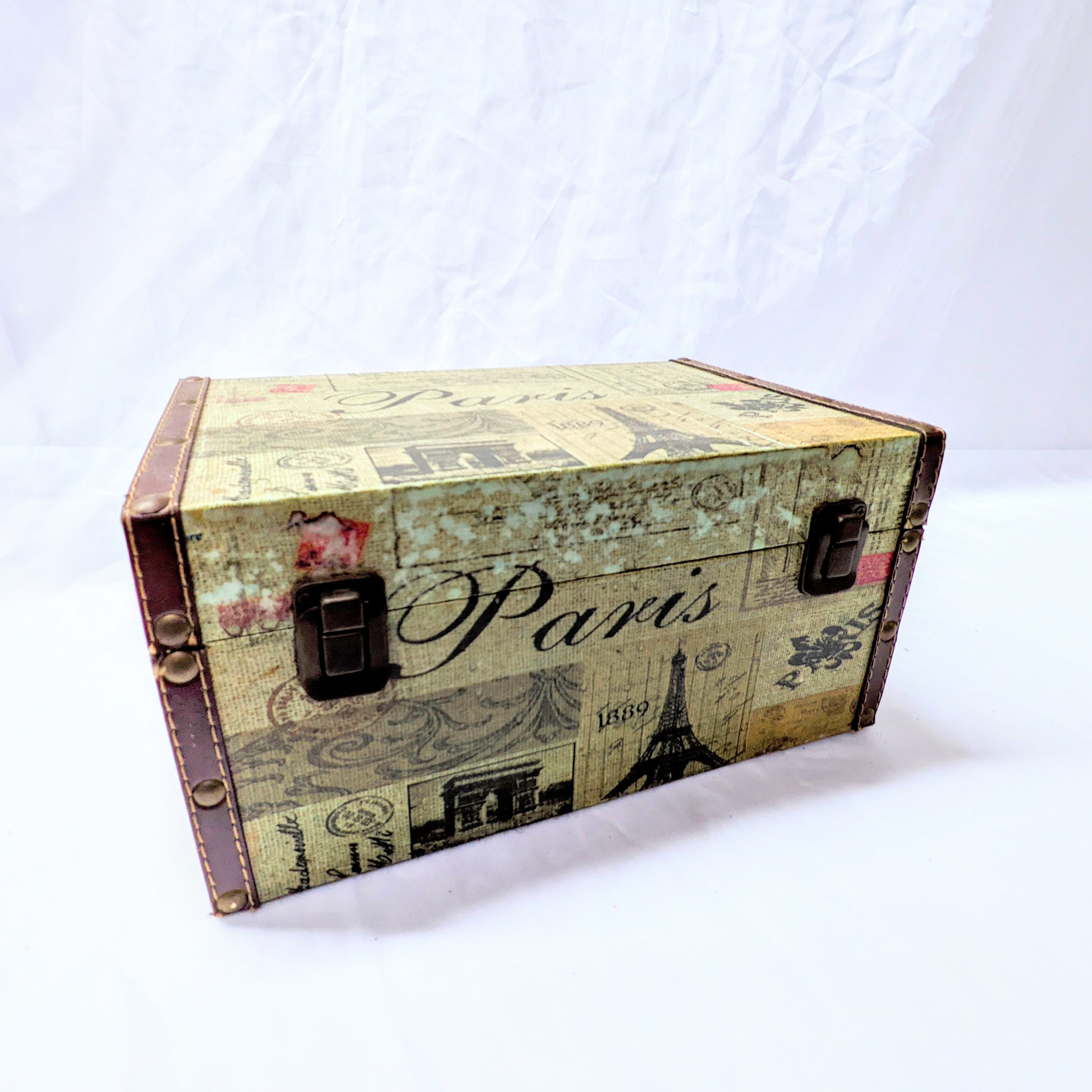 vintage paris suitcase with metal details for wedding or event decor