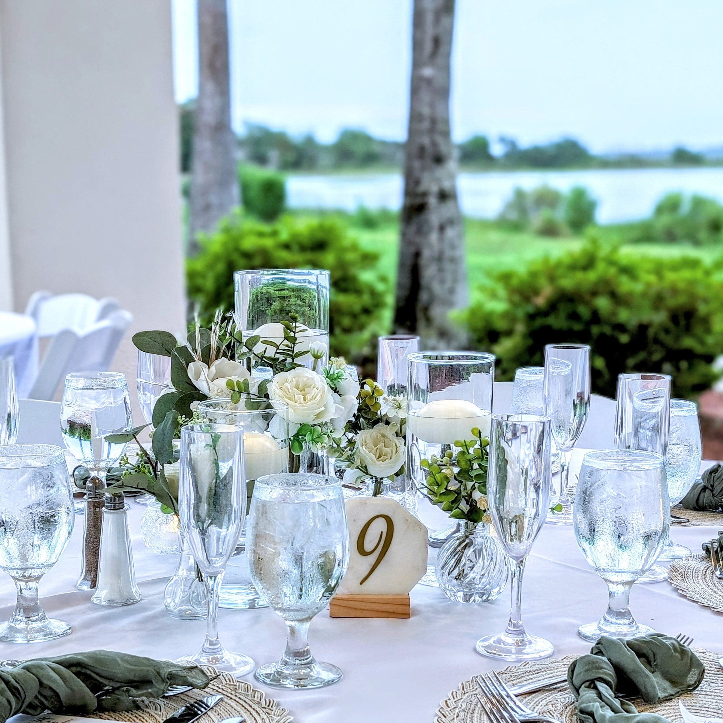cylinder vase centerpiece rental in panama city beach classic floating candles