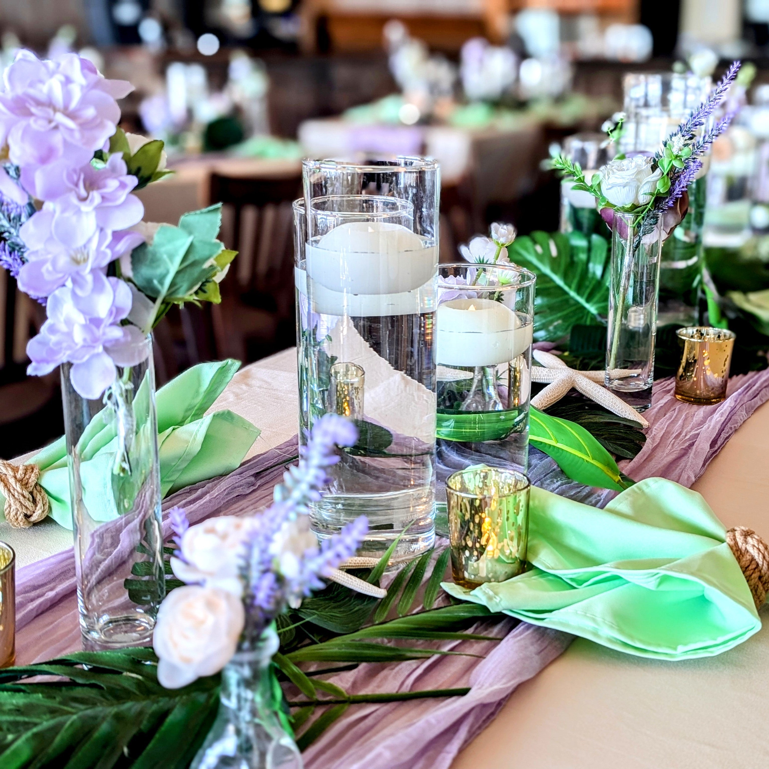 cylinder vase with floating candles rental in panama city beach centerpiece or aisle markers