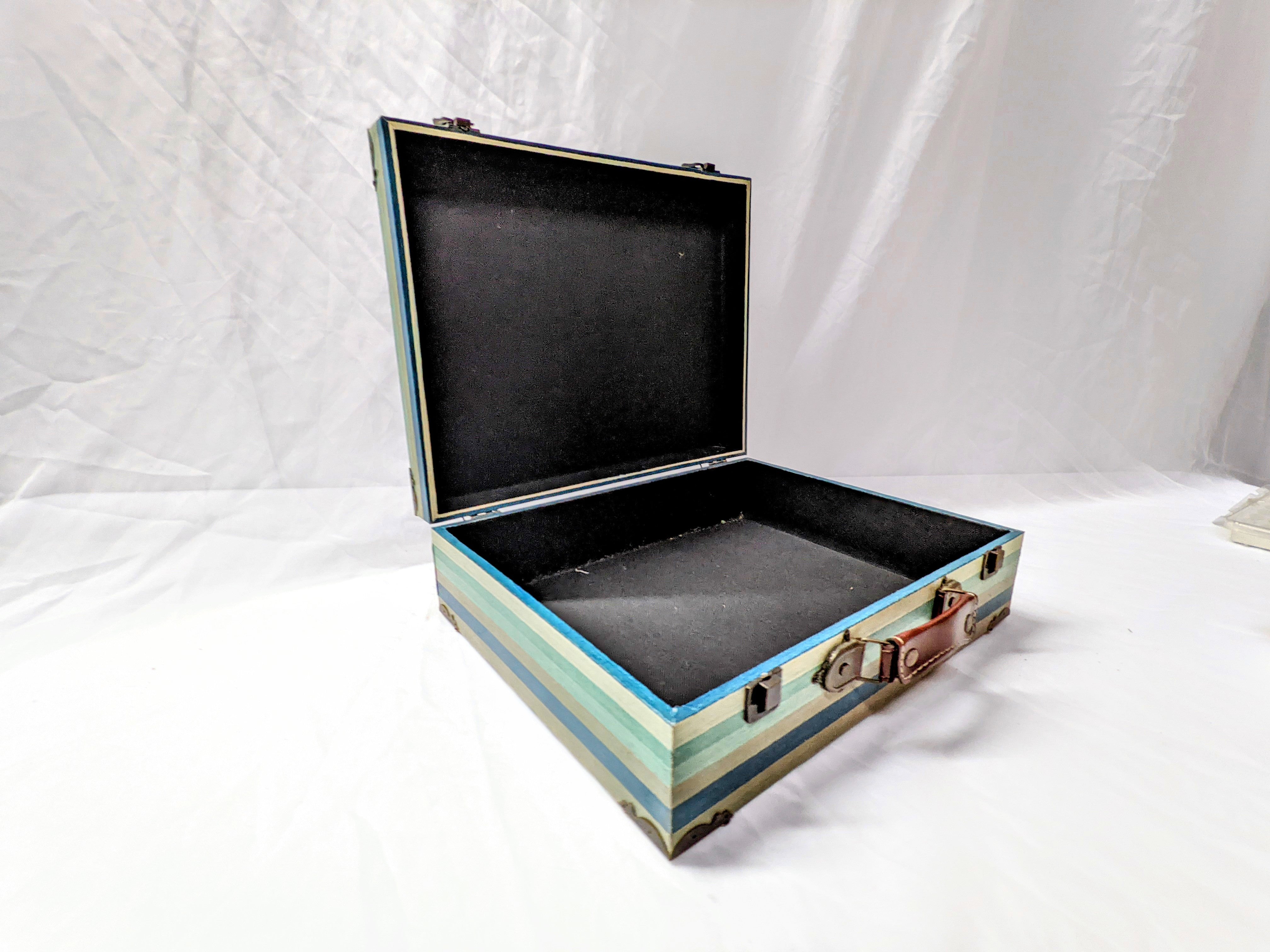 blue green and wood vintage suitcase with metal and leather details for wedding or party use as a card holder or display