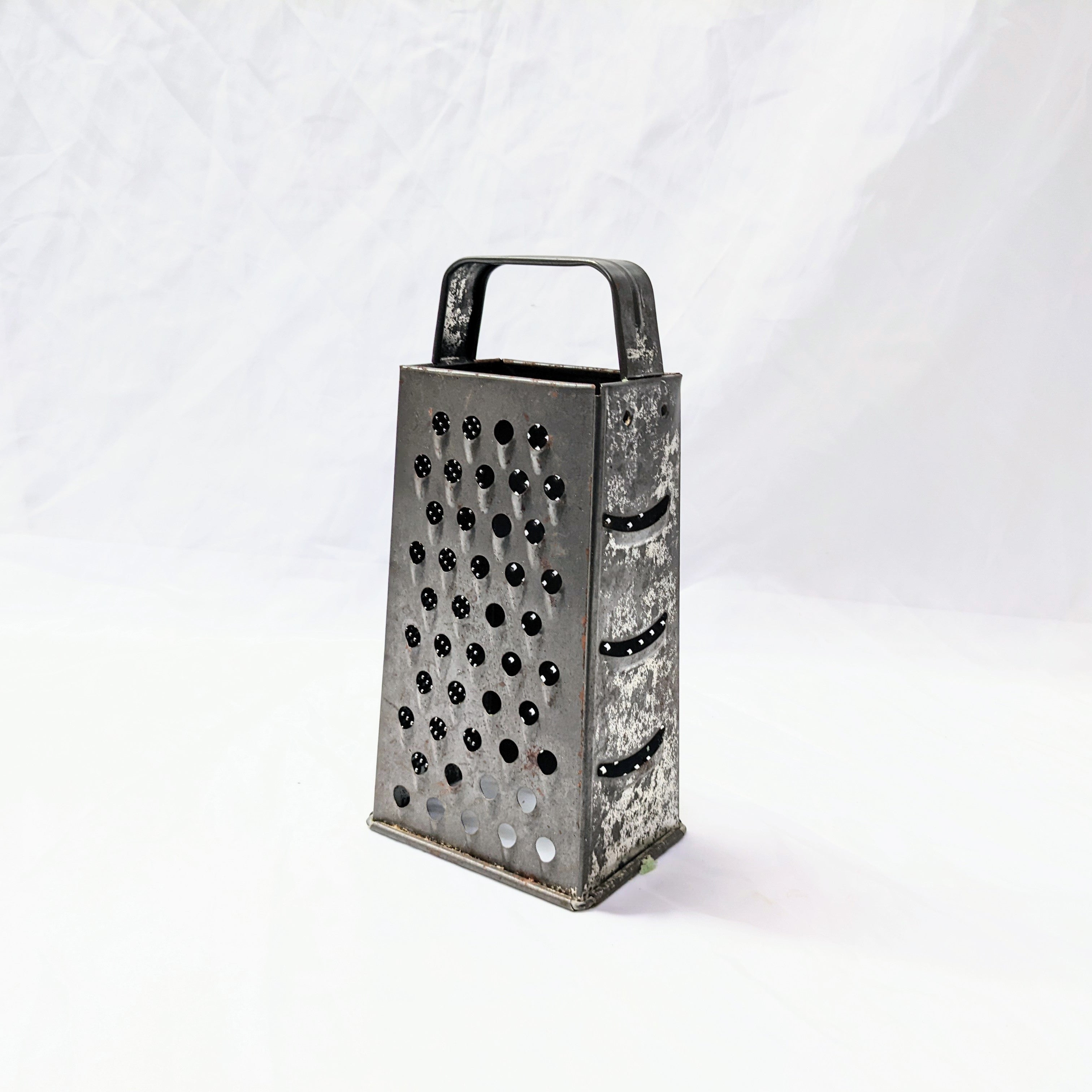 Vintage cheese grater aged metal kitchen utensil for rustic decor wedding or special event
