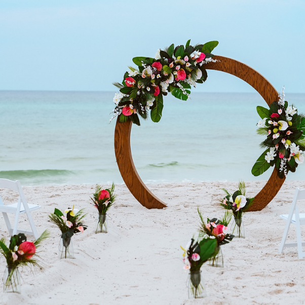 wood circle moon gate wedding arch arbor beach wedding rental in panama city beach tropical wedding flowers florist