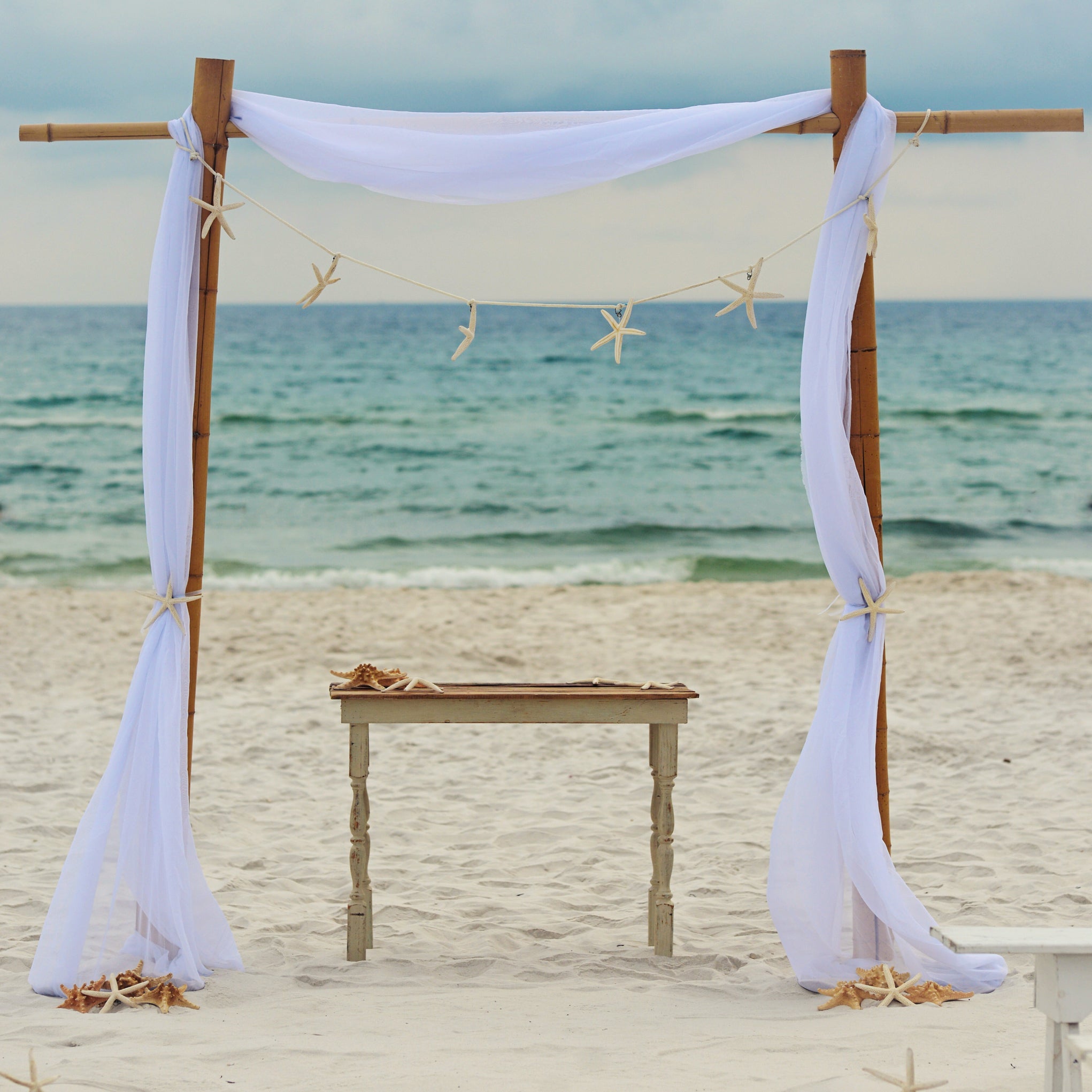 2 post bamboo wedding arbor rental in panama city beach florida