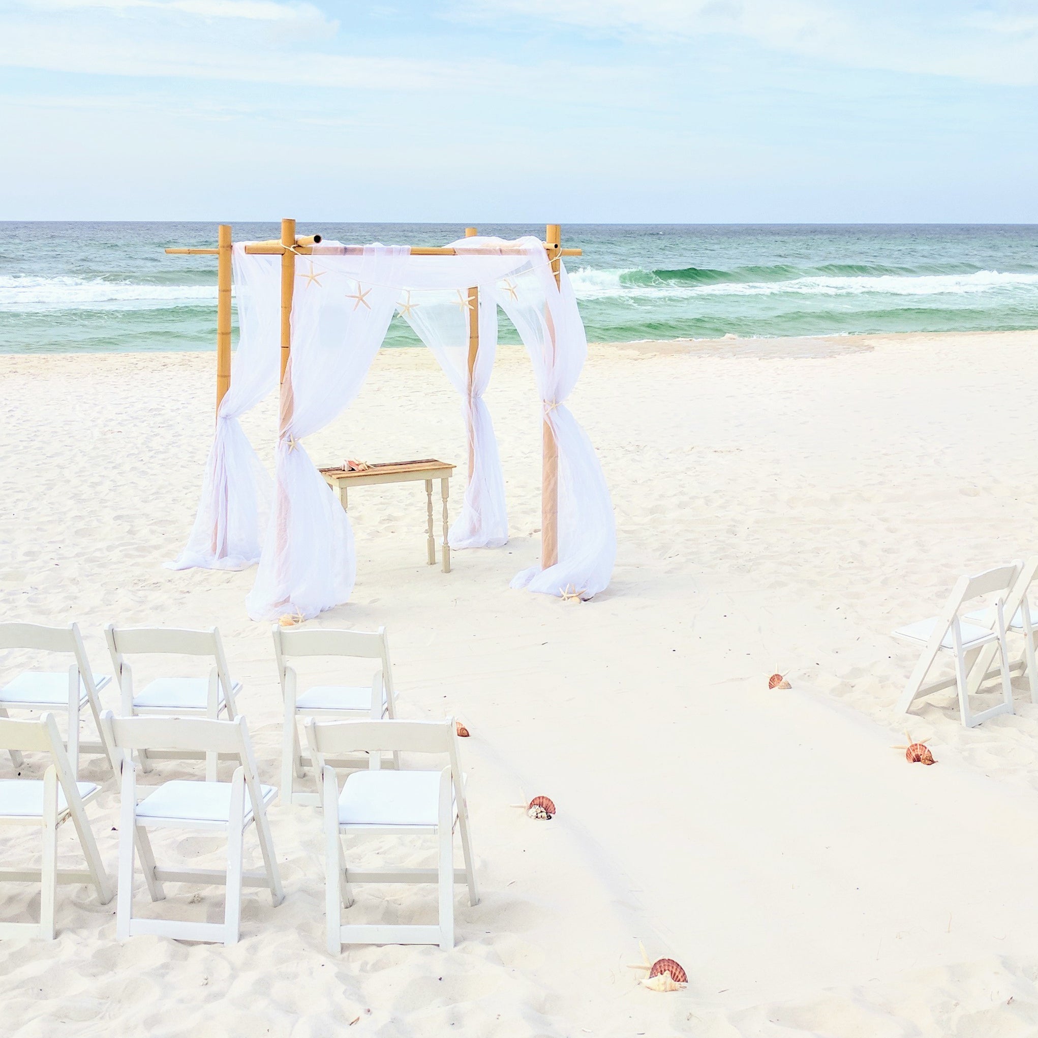 4 post bamboo beach wedding arbor arch rental in Panama City Beach FL