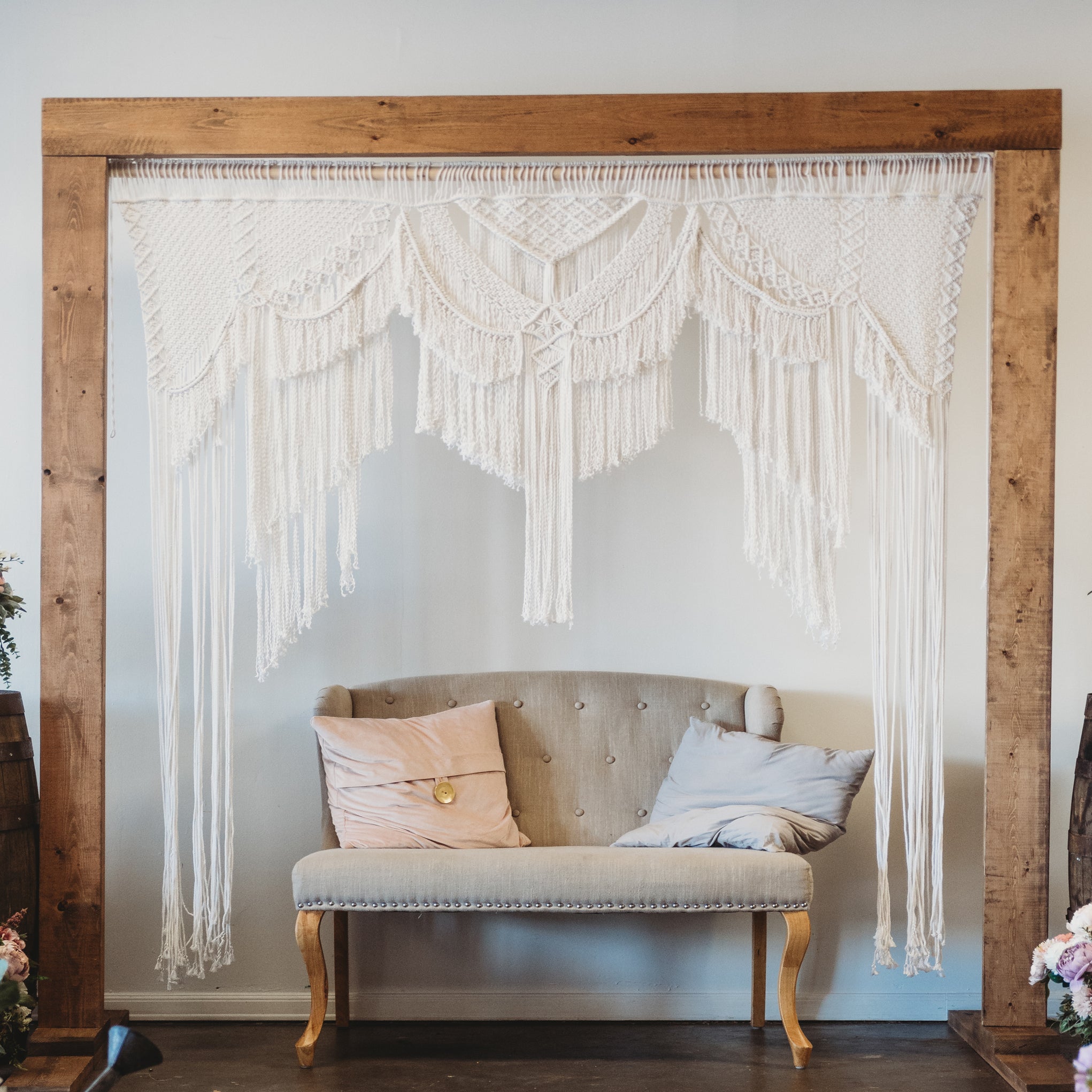 Boho Macrame Wedding arbor with wood arch included for rent in Panama City Beach FL