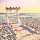 destination-beach-wedding-elopement-arbor-arch-rental-decorations-lantern-aisle-markers-panama-city-beach-wedding-planner-officiant-photographer-rentals