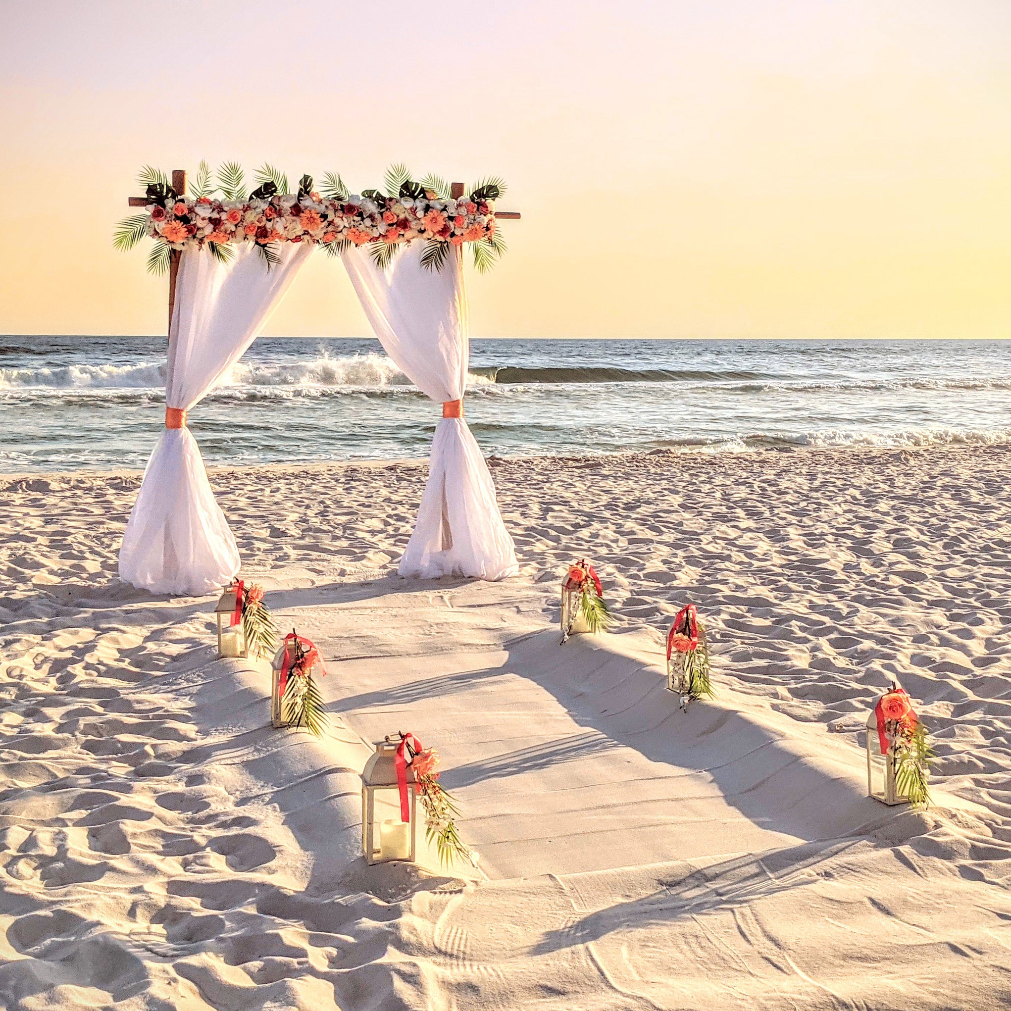 destination-beach-wedding-elopement-arbor-arch-rental-decorations-lantern-aisle-markers-panama-city-beach-wedding-planner-officiant-photographer-rentals
