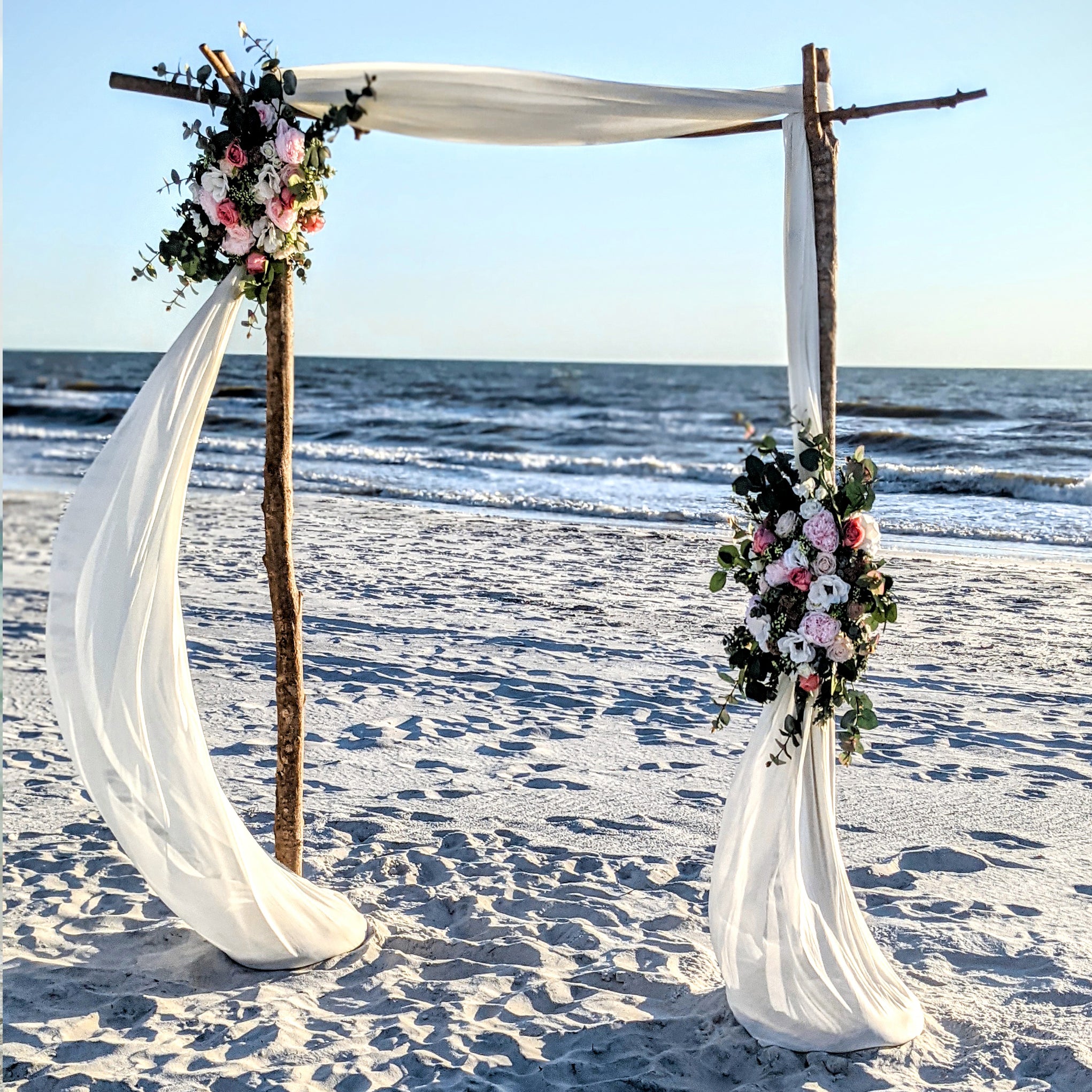 destination-beach-wedding-elopement-arbor-arch-rental-decorations-lantern-aisle-markers-panama-city-beach-wedding-planner-officiant-photographer-rentals