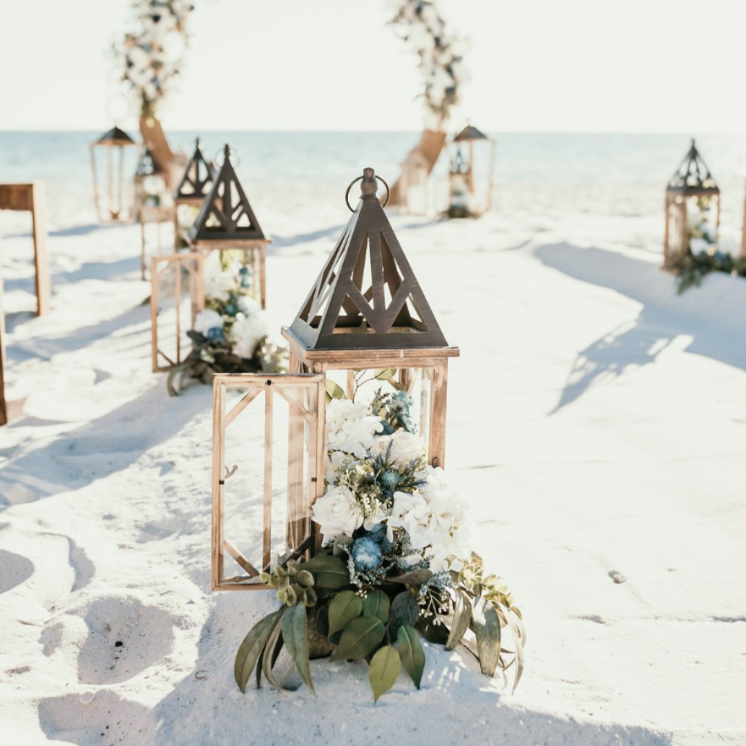 Wedding party and event aisle marker rentals in Panama City Beach, Florida. Wedding planner, designer, rentals, with or without setup and florist services.