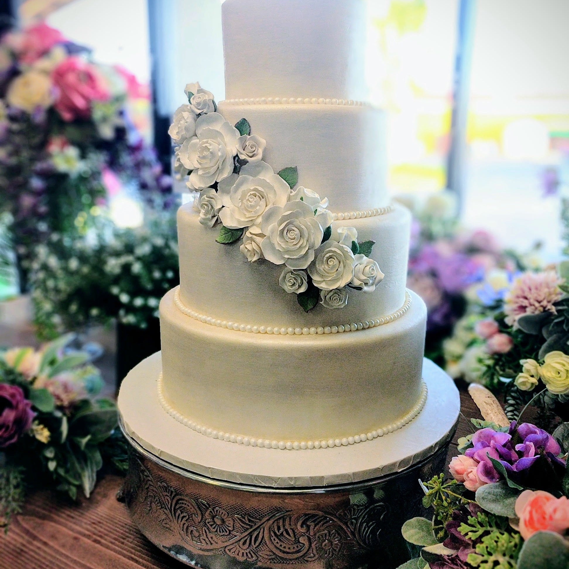 silver metal wedding cake stand in Panama City Beach 
