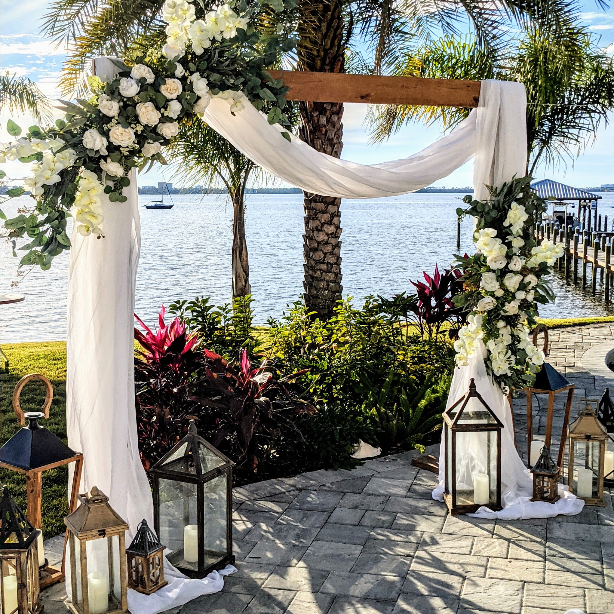 2-post wooden wedding ceremony arbor panama city beach wedding rental 