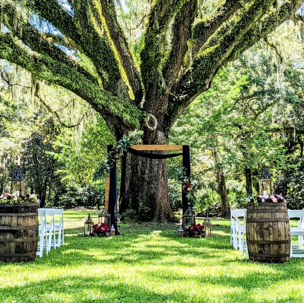 2-post wooden wedding ceremony arbor panama city beach wedding rental 