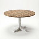 Round wooden table with a white pedestal base on a white background