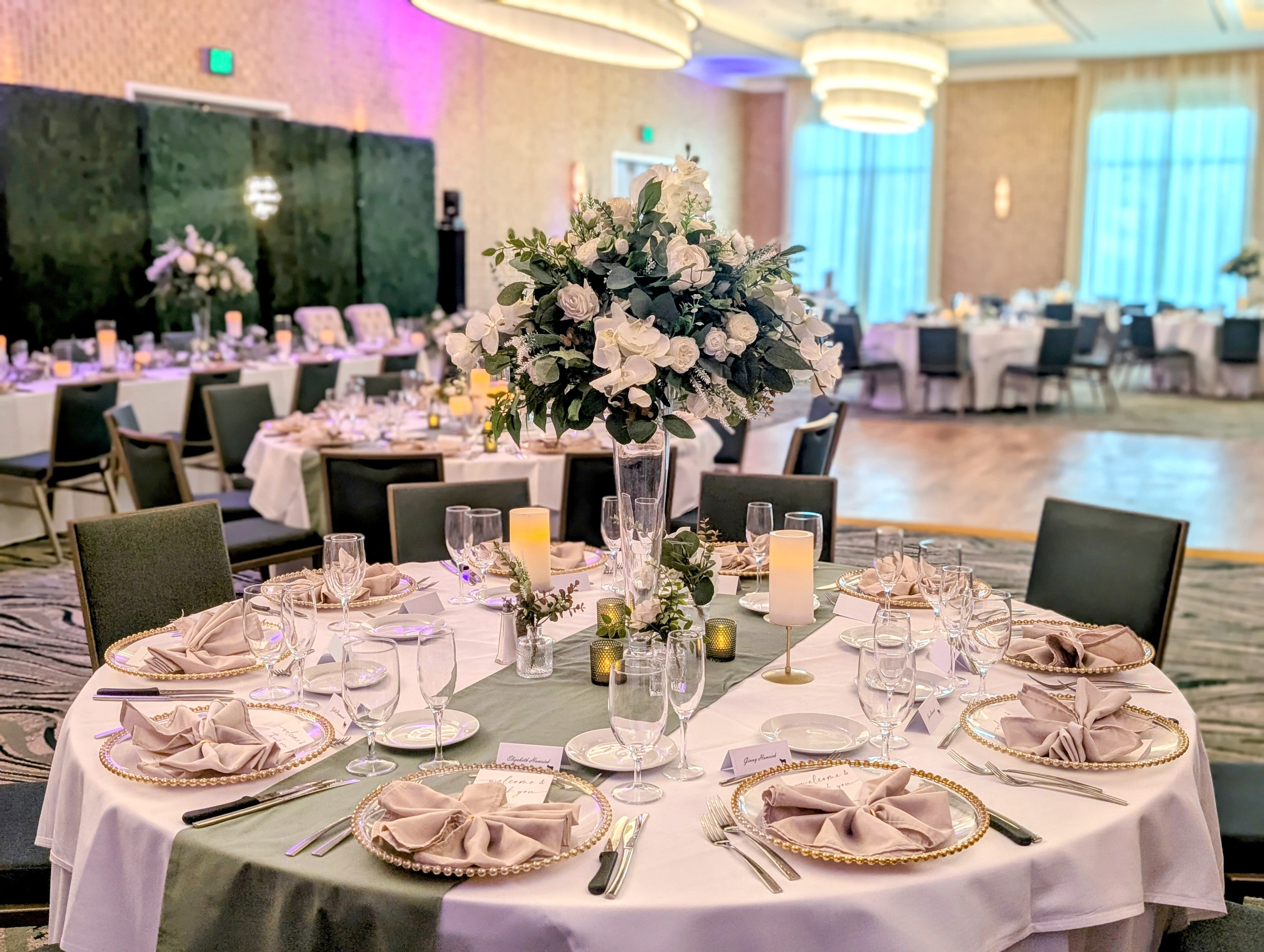 Decorated banquet hall with tables set for a formal event