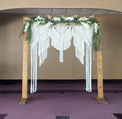 Boho Macrame Wedding arbor with wood arch included for rent in Panama City Beach FL