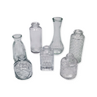 Assorted glass bud vases rental in panama city beach boho brown emerald green clear 