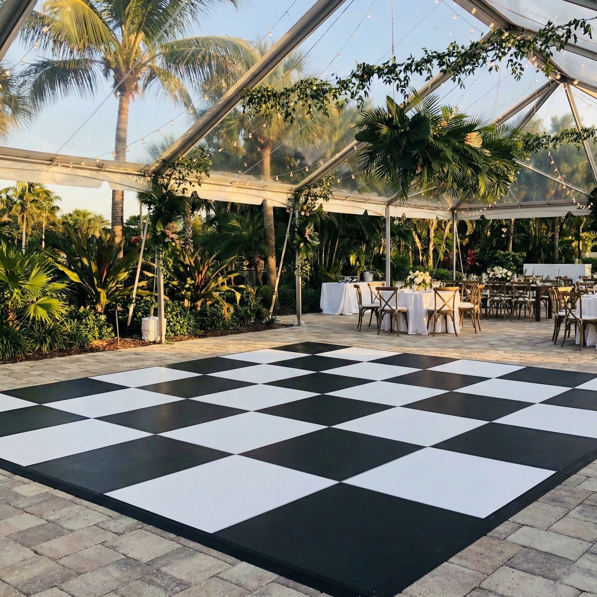Black and white checkered dance floor rental Panama City Beach wedding.