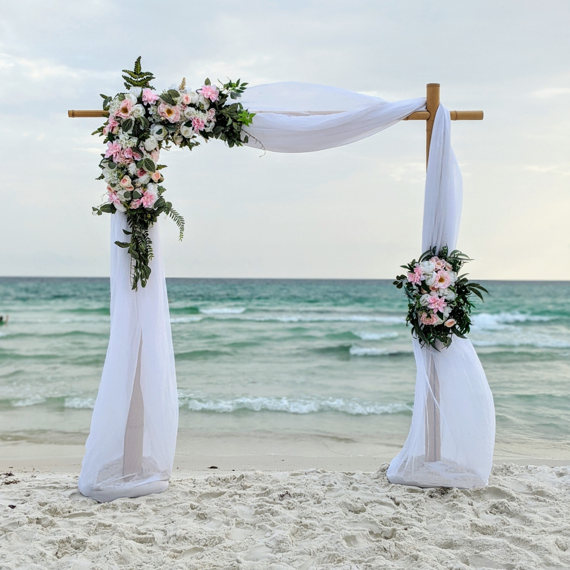 chiffon arbor drape white panama city beach wedding party event rental