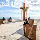 Oversized wooden wedding cross arbor rental in panama city beach florida