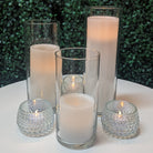 cylinder vase cluster with led pillar candle centerpiece rental in Panama city beach