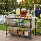 Outdoor drink station with lemonade and iced tea at a garden party.
