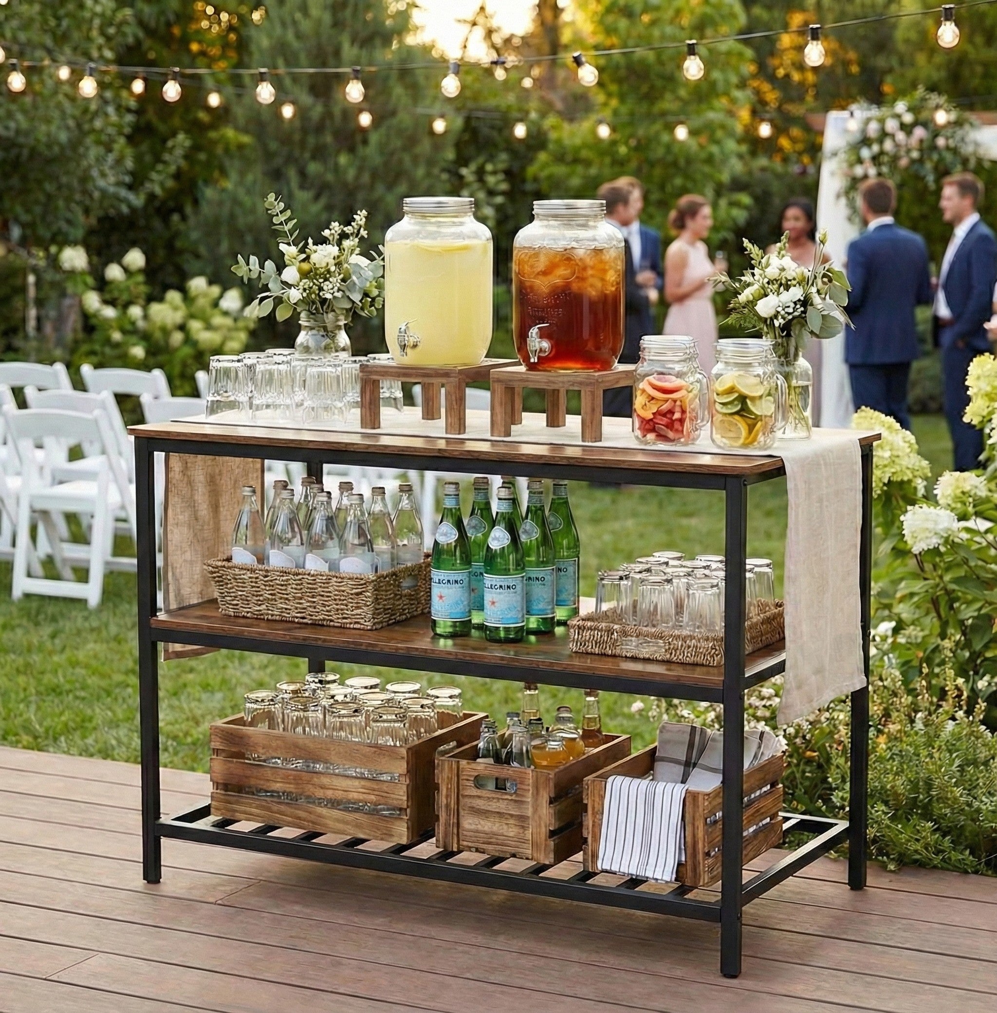 Outdoor drink station with lemonade and iced tea at a garden party.