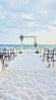 Destination beach wedding video in panama city beach at sunset with bonfire and beach reception.