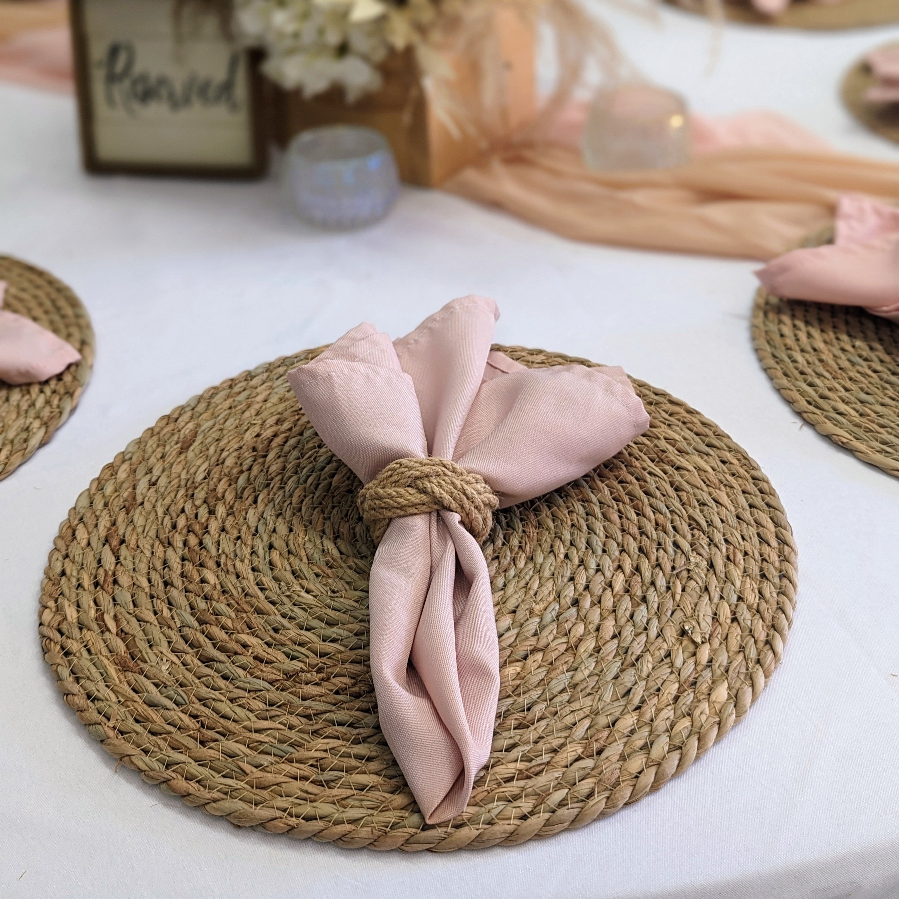 round woven wicker rattan charger rental in panama city beach