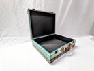 blue green and wood vintage suitcase with metal and leather details for wedding or party use as a card holder or display 