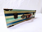 blue green and wood vintage suitcase with metal and leather details for wedding or party use as a card holder or display 