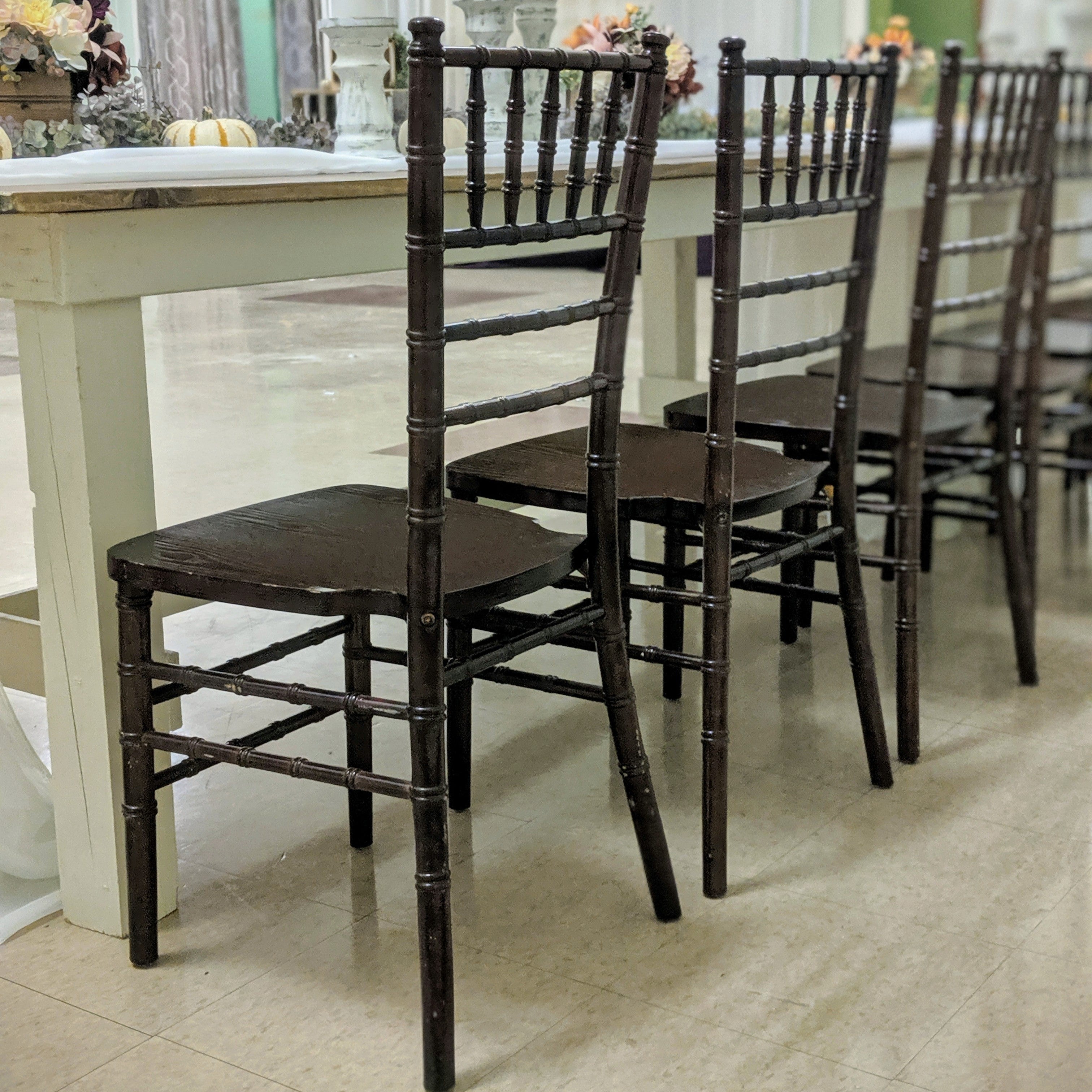 Mahogany chiavari chair rental in panama city beach florida with 2 toned farmhouse table