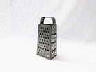 Vintage cheese grater aged metal kitchen utensil for rustic decor wedding or special event