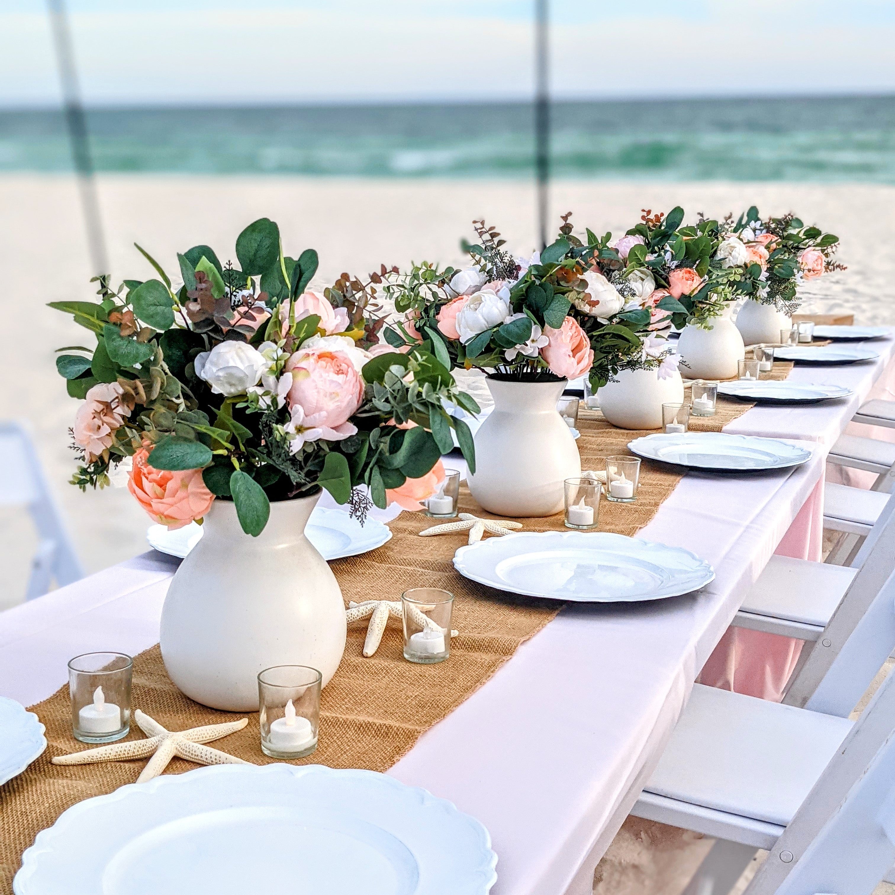 white ceramic vase centerpiece rental in panama city beach
